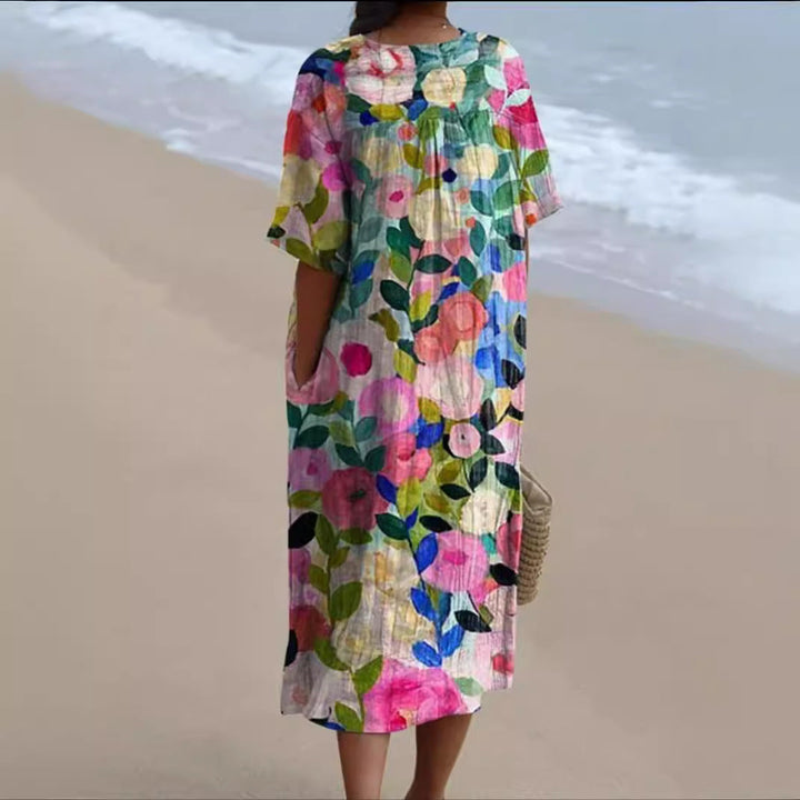 Nienke - Kleurrijke jurk met bloemenprint